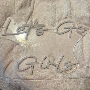 ‘Let’s Go Girls’ neon sign